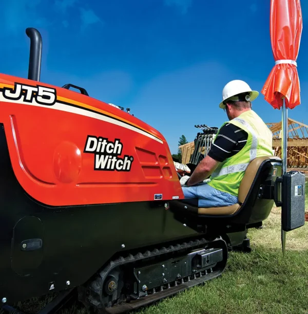 Technician performing a trenchless water line replacement